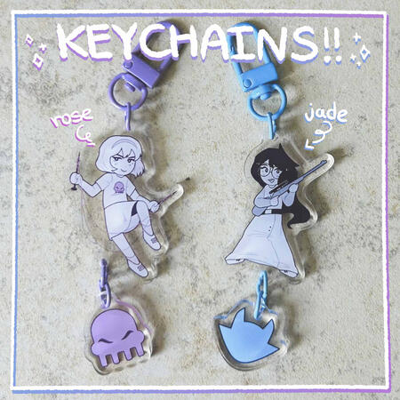 linking keychain designs of rose lalonde and jade harley from the webcomic homestuck
